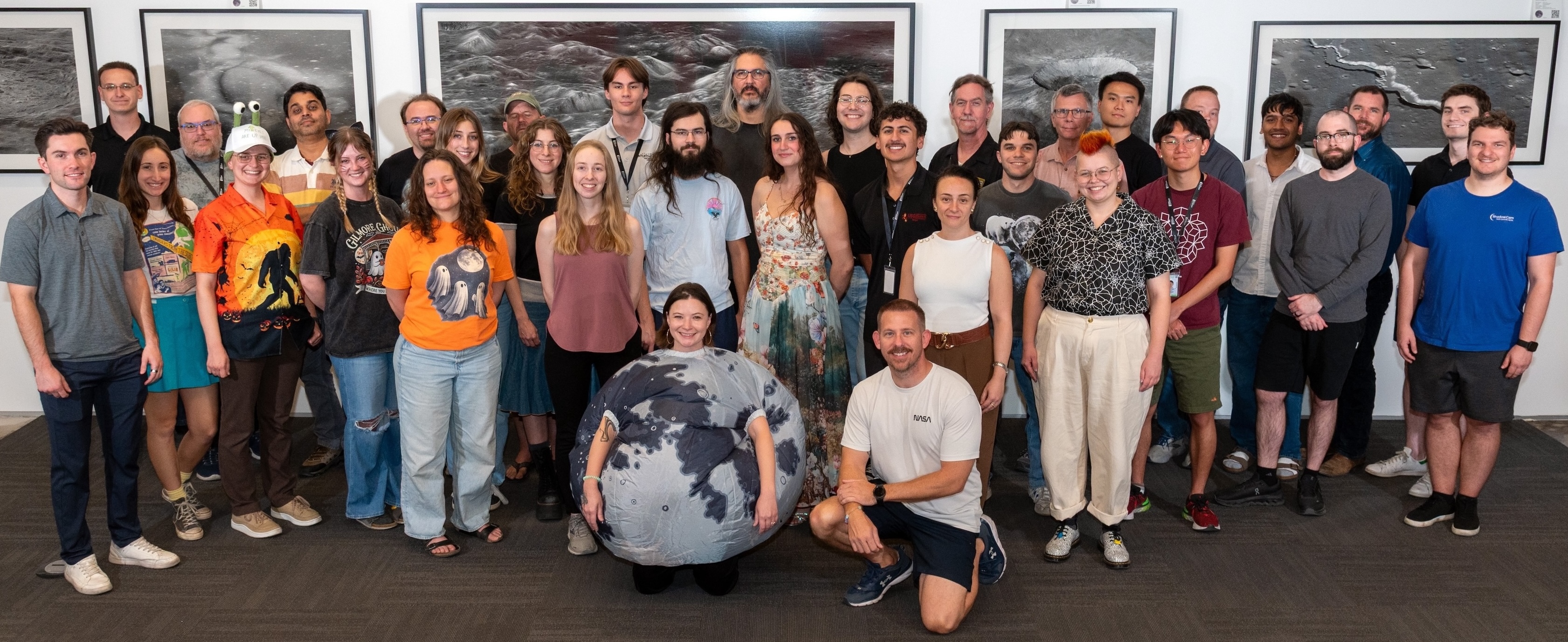 The Lunar Reconnaissance Orbiter Team standing inside the LROC Science Operations Center, August 2024.