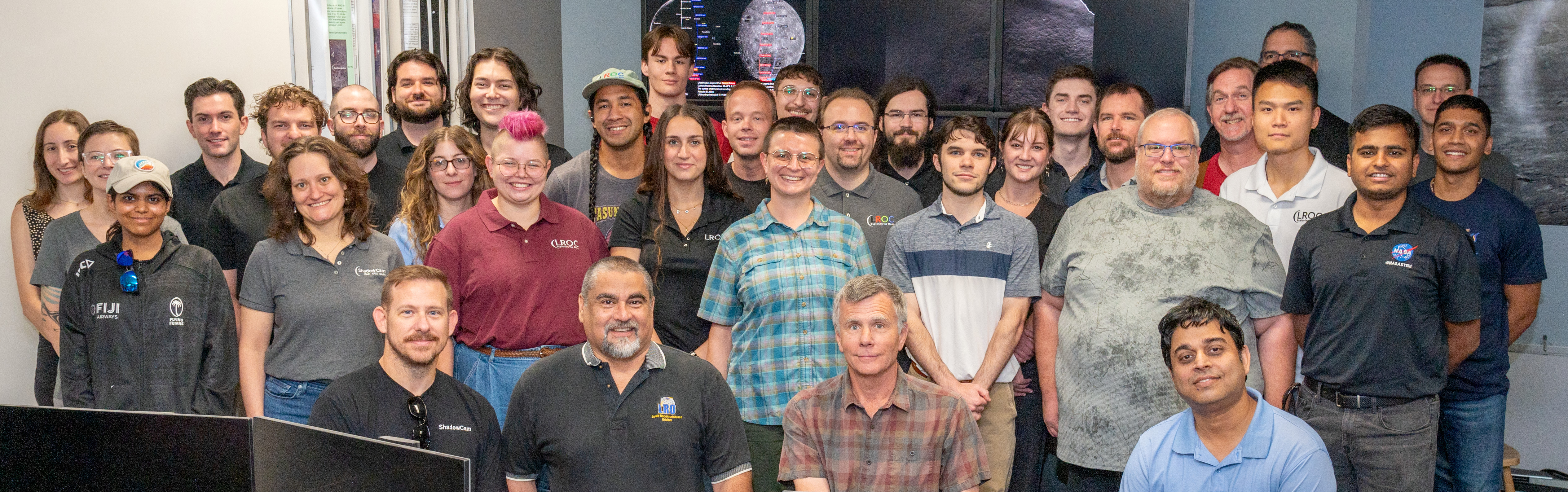 The Lunar Reconnaissance Orbiter Team standing inside the LROC Science Operations Center, August 2024.